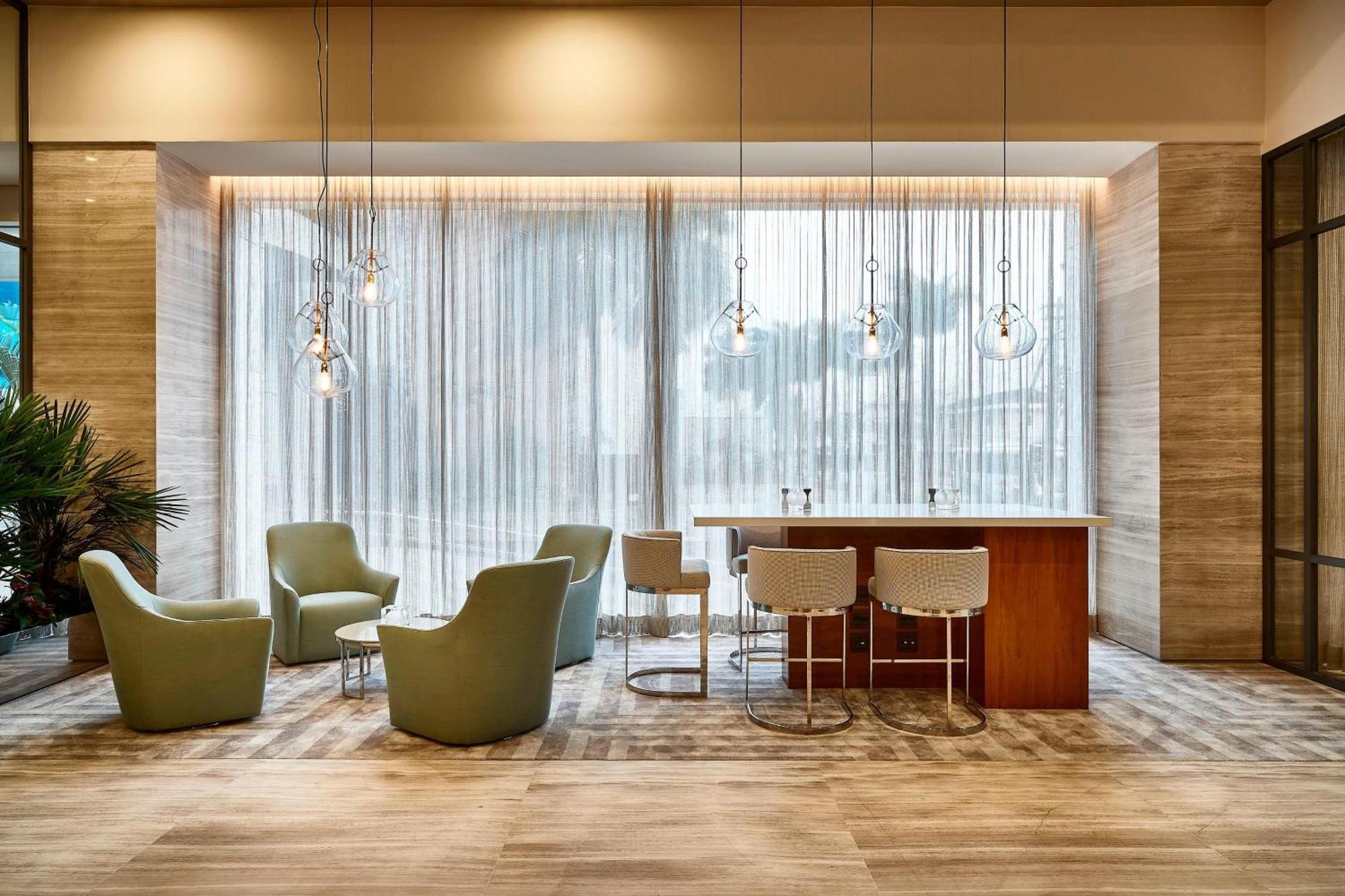 Sheraton Santos Hotel Экстерьер фото The lounge at the airport