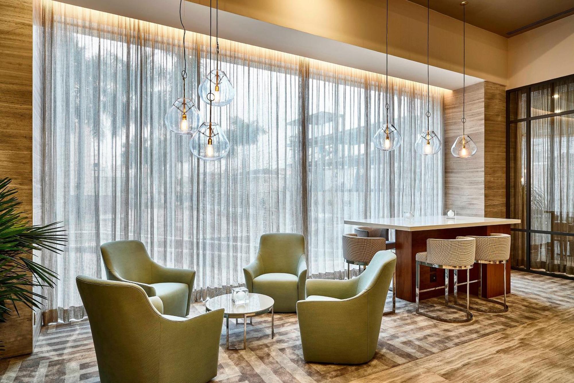 Sheraton Santos Hotel Экстерьер фото The lounge at the airport