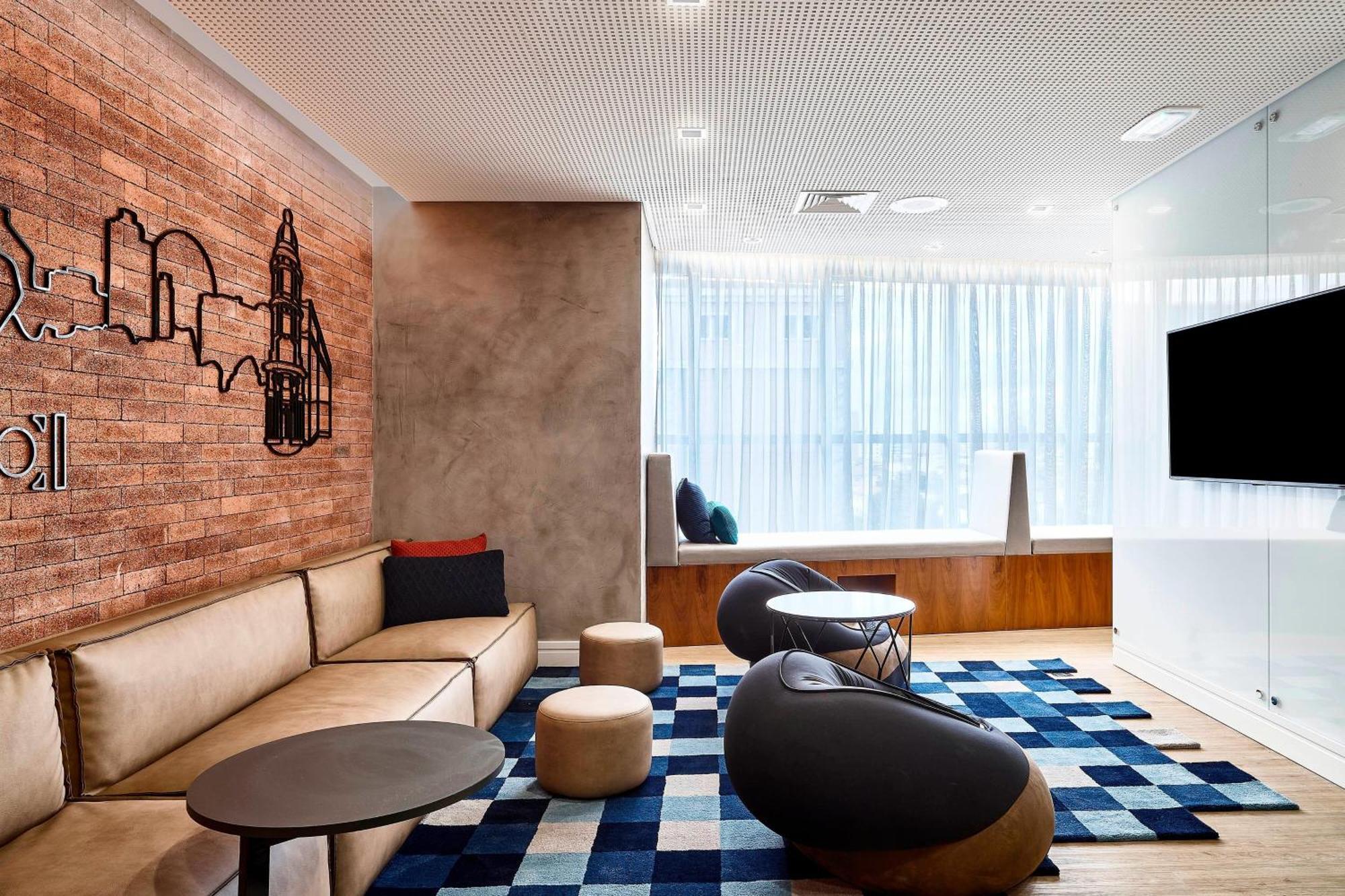 Sheraton Santos Hotel Экстерьер фото The lounge at London Heathrow Airport