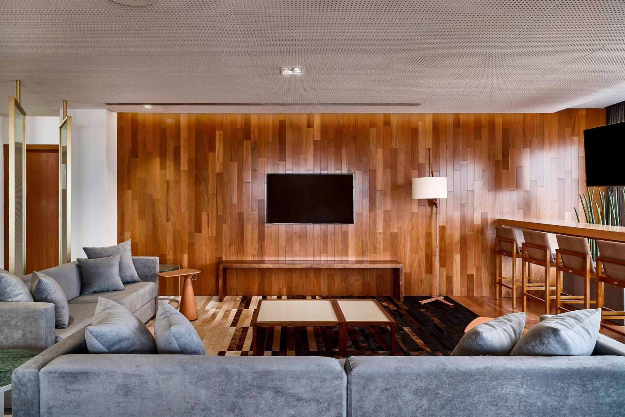 Sheraton Santos Hotel Экстерьер фото The lounge at the airport